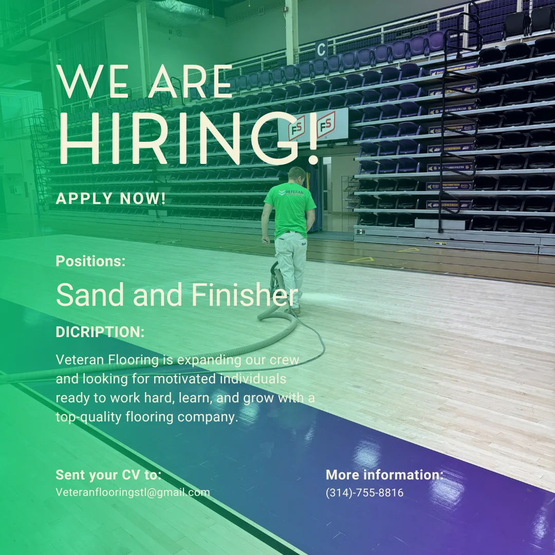 Veteran Flooring crew member sanding a gym hardwood floor - we are hiring a sand and finisher